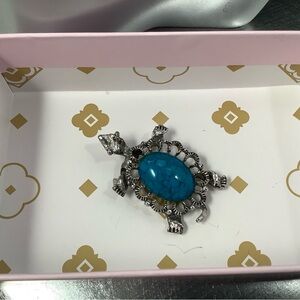 Gerry’s signed turtle pin